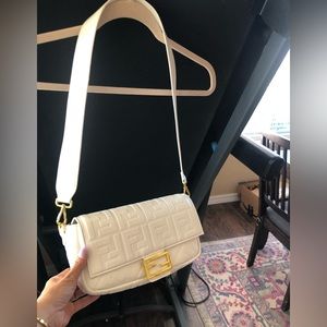 White bag with two strap options, gold hardware